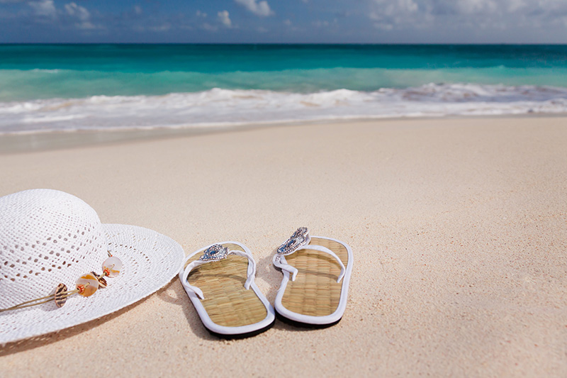 Relieve Stress At The Beach - Image of Hat and Sandals 